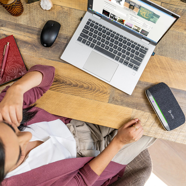 Poly-Sync-20-Smart-Speakerphone-Black-Home-Female-Teams-Lifestyle-Web